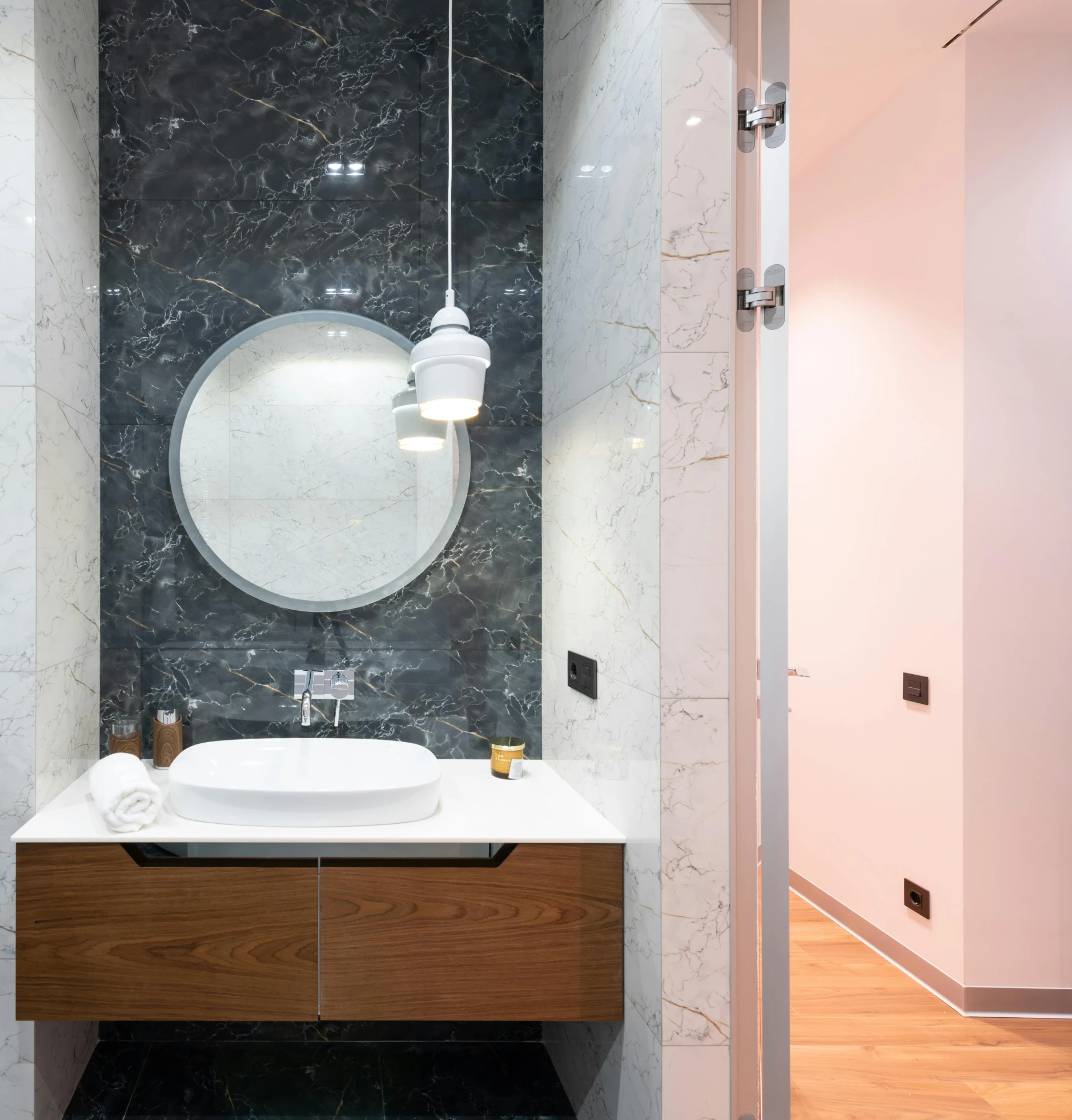 a bathroom with a sink and a mirror, by Adam Marczyński, fan favorite, circular, fancy apartment, thumbnail