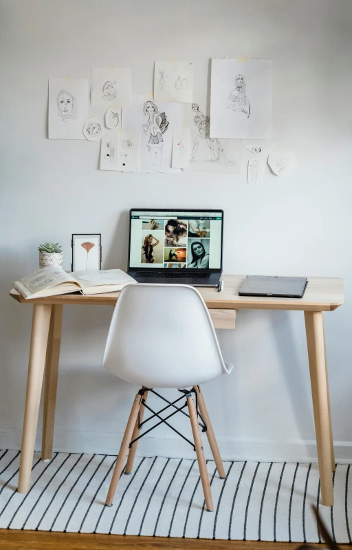 a laptop computer sitting on top of a wooden desk, by Will Ellis, pexels, in a white boho style studio, demur, small and cosy student bedroom, whiteboards