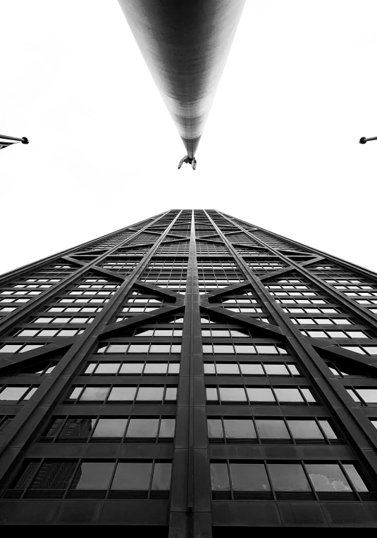 a black and white photo of a tall building, pexels contest winner, hanging upside down, rocket launching into the sky, modern chicago streets, endless loop