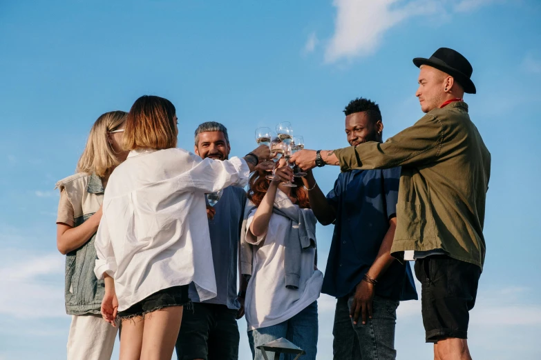 a group of people standing around each other, pexels contest winner, renaissance, battle toast, diverse, awarding winning, summertime