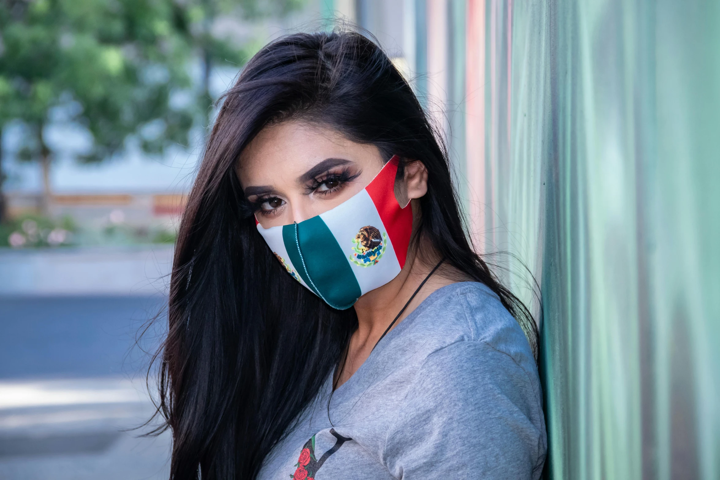 a woman wearing a mexican flag face mask, pexels contest winner, graffiti, 64x64, olivia culpo, islamic, college