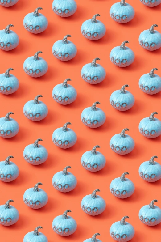 a group of blue pumpkins on an orange background, by Ryan Pancoast, conceptual art, 256x256, candy decorations, goop, red and cyan theme