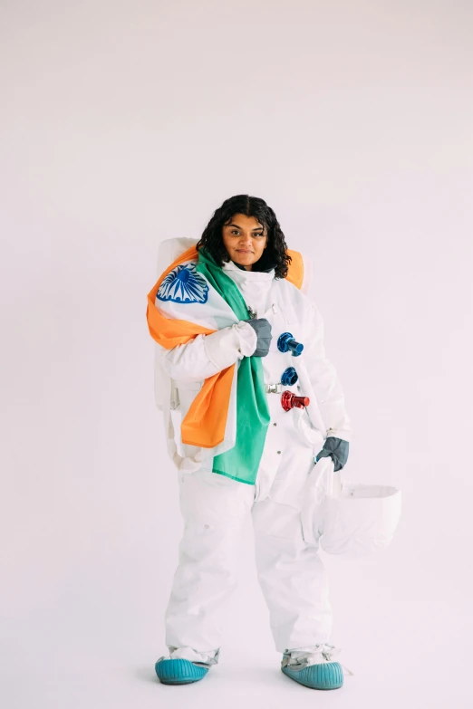 a woman in an astronaut suit posing for a picture, an album cover, indian flag, profile image, wearing festive clothing, off - white collection