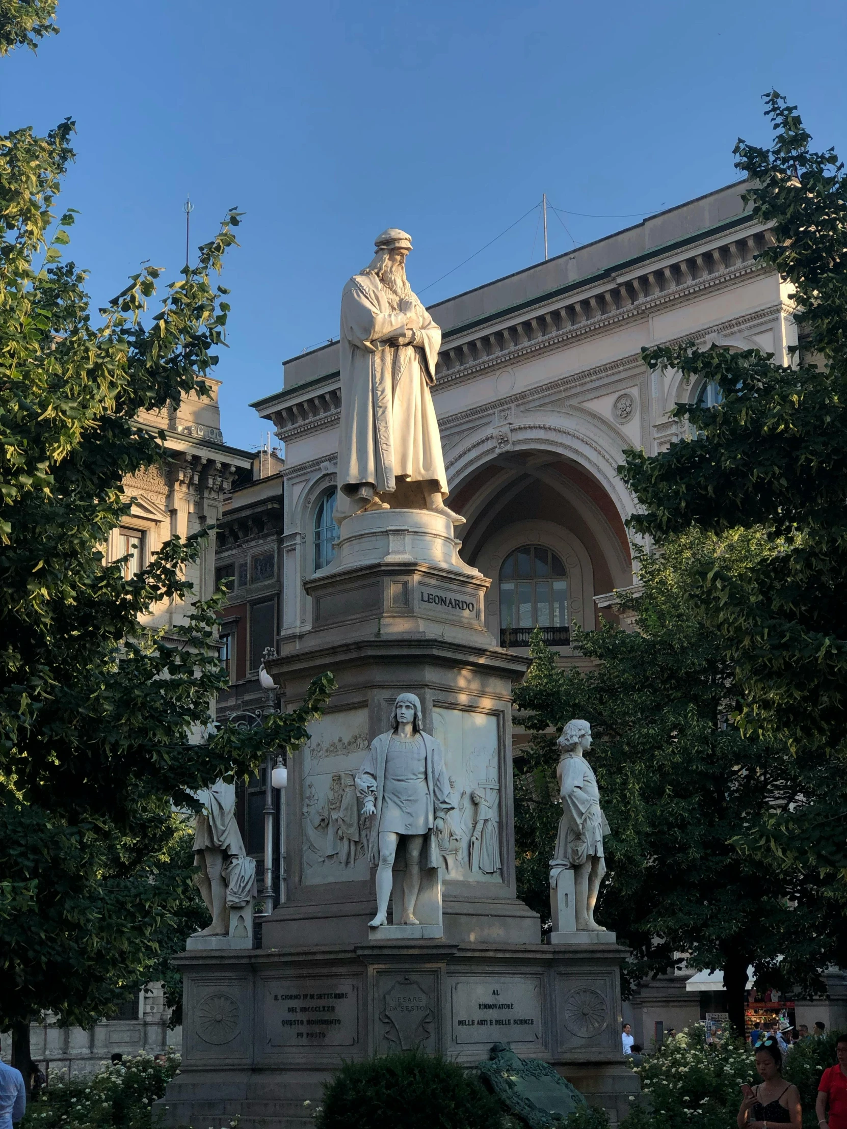 a statue of a man standing in front of a building, a statue, inspired by Giovanni Battista Innocenzo Colombo, 🚿🗝📝, robed renaissance scholar, in the center of the image, demna gvasalia