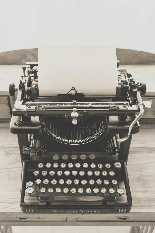 a black and white photo of an old typewriter, unsplash, private press, avatar image, sepia colors, multiple stories, snapchat photo