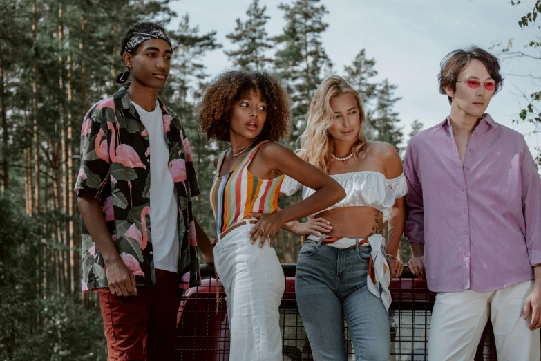 a group of people standing next to each other, a portrait, trending on pexels, casual summer clothes, ashteroth, in style of heikala, promotional image