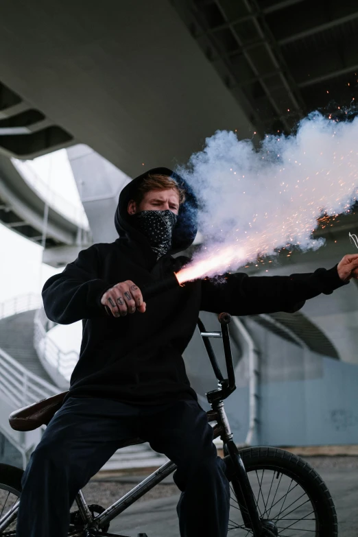 a man on a bike with smoke coming out of his mouth, pexels contest winner, renaissance, holding a blaster, soccer player timo werner, wearing urban techwear, with violence