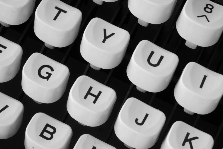 a close up of a black and white typewriter keyboard, by John Hutton, digital image, image