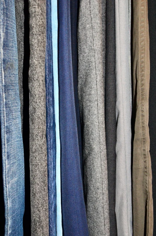 a closet filled with lots of different colored jeans, unsplash, blue and grey, 8k fabric texture details, large tall, academic clothing