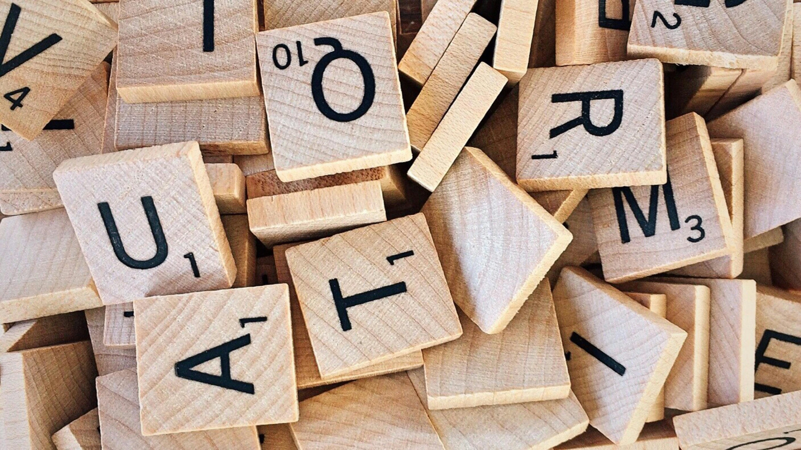 a pile of scrabbles sitting on top of each other, by Emma Andijewska, unsplash, art & language, square, a wooden, 15081959 21121991 01012000 4k, writing a letter