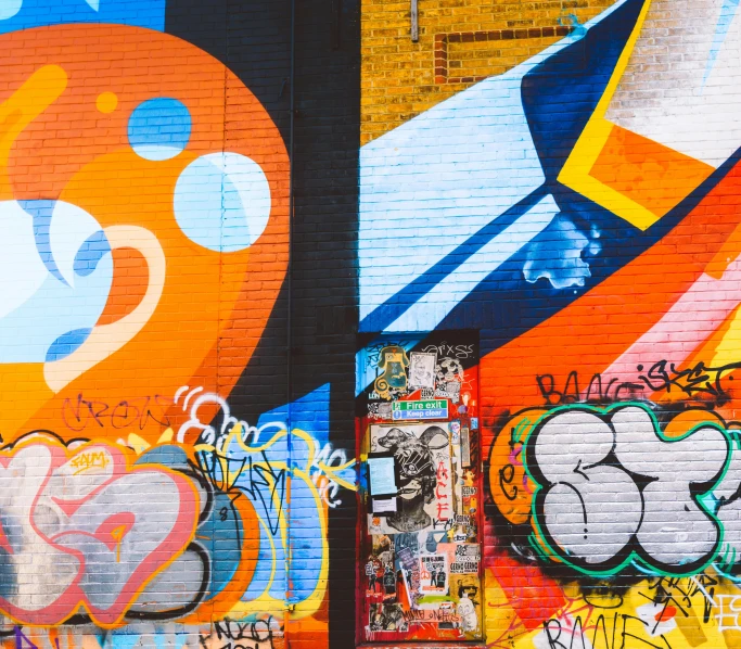 a red fire hydrant sitting in front of a wall covered in graffiti, graffiti art, pexels contest winner, orange and blue color scheme, 144x144 canvas, tristan eaton's wallpaper, a colorful