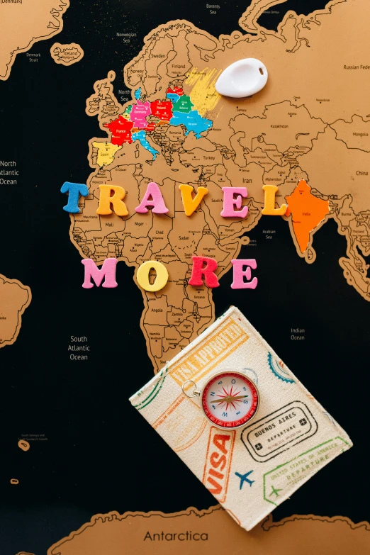 a map of the world with travel more written on it, an album cover, by Julia Pishtar, trending on unsplash, playing board games, brightly coloured, brown, thumbnail