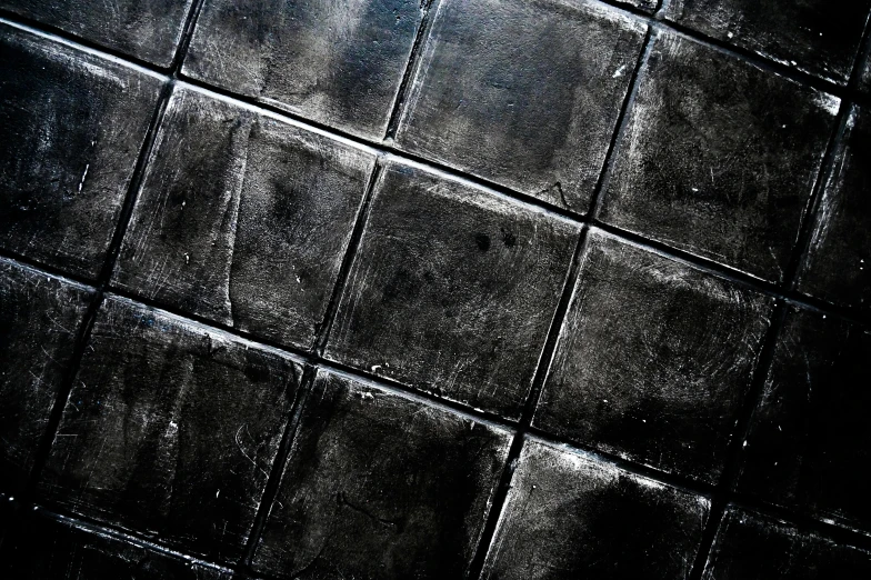 a fire hydrant sitting on top of a tiled floor, an album cover, by Adam Chmielowski, unsplash, bauhaus, high resolution coal texture, abstract black leather, square, paint texture