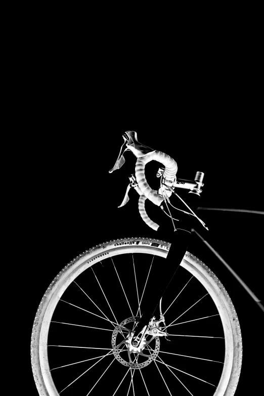 a black and white photo of a bicycle, a black and white photo, by Adam Chmielowski, white on black, whip, rim lights, half and half