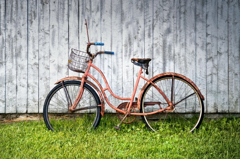 an old rusty bicycle leaning against a wooden fence, by Alison Geissler, pexels contest winner, photorealism, colorized photo, painted metal, profile image, fan favorite