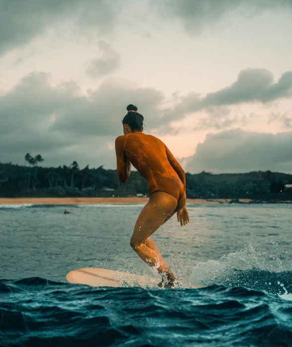 a man riding a surfboard on top of a wave, bella poarch, full frontal, tanned, toned derriere