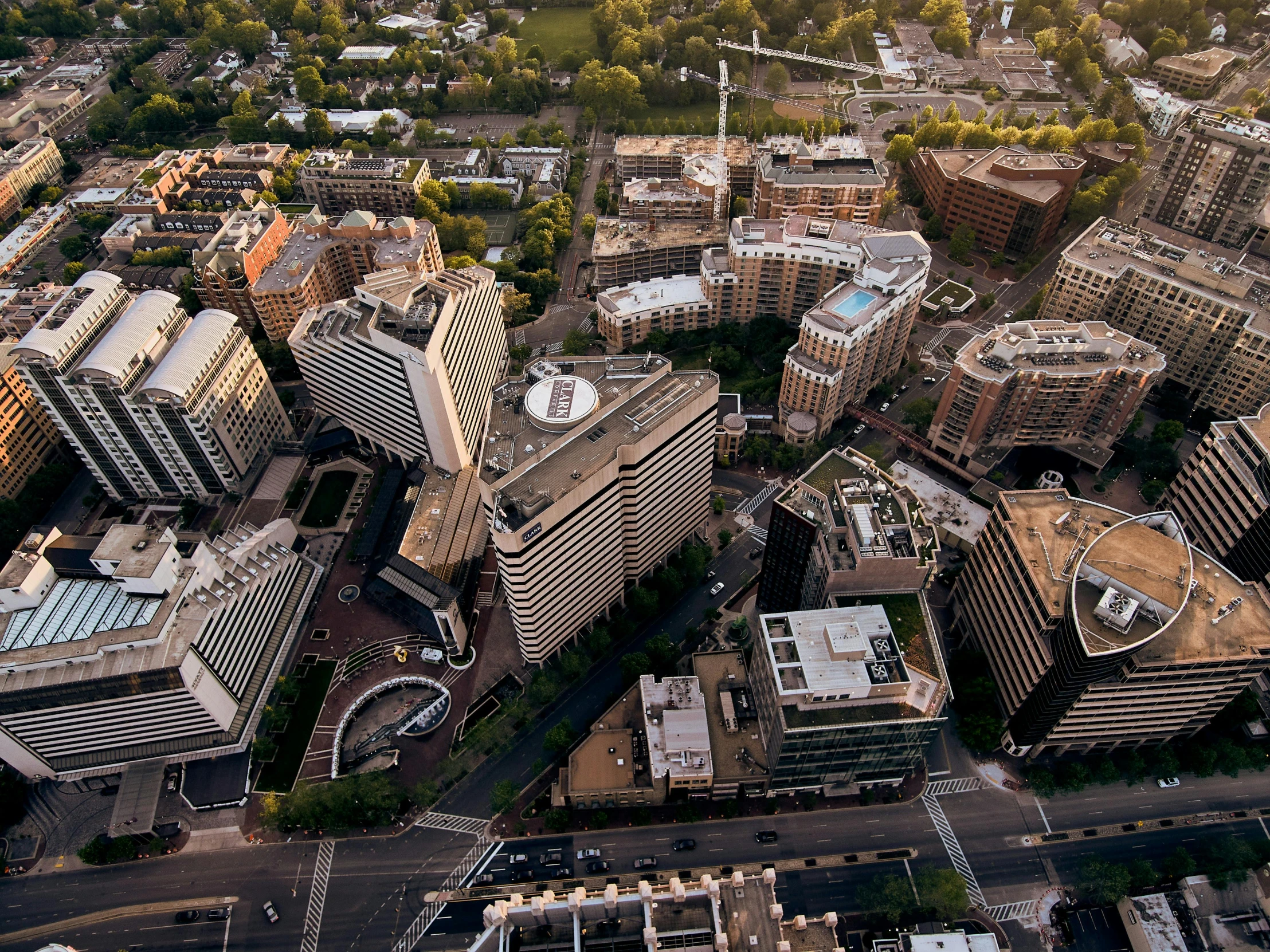 an aerial view of a city with tall buildings, by Washington Allston, pov photo, fan favorite, capital plaza, high-resolution