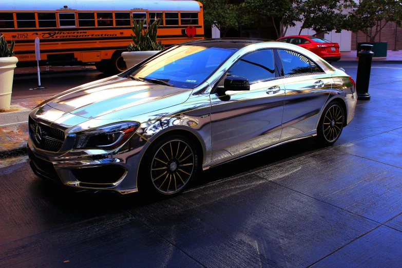 a silver car parked in front of a school bus, a hyperrealistic painting, pexels contest winner, ornate galactic gold, mercedes, samurai vinyl wrap, los angeles 2 0 1 5