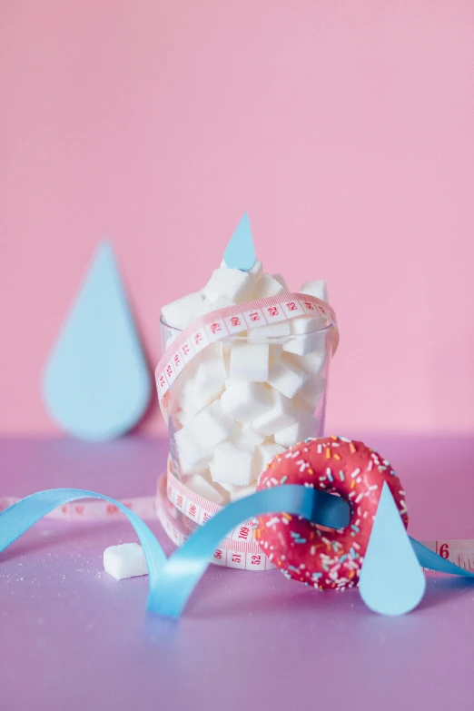 a couple of doughnuts sitting on top of a table, a still life, by Elsa Bleda, marshmallows, raindrop, profile image, made of candy