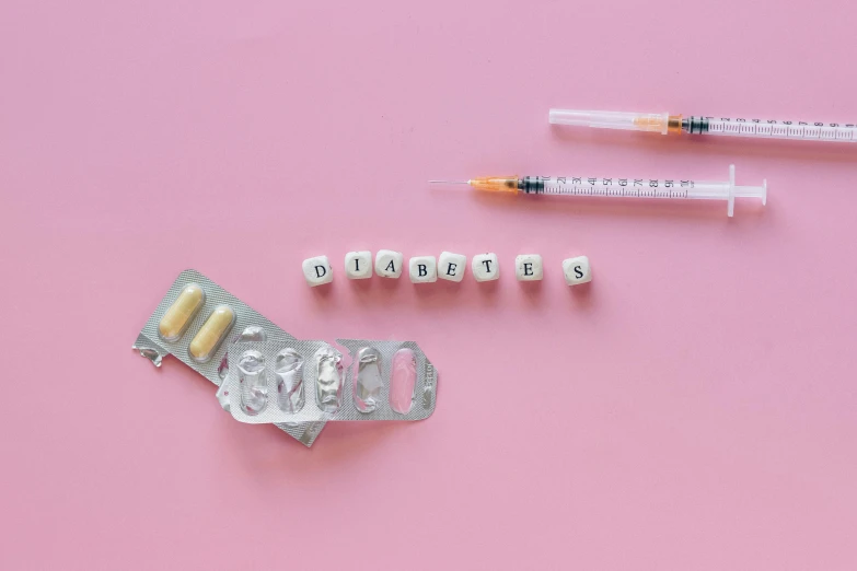 a bunch of pills and a syssor on a pink background, by Daniel Lieske, trending on pexels, dau-al-set, bubble letters, surgical implements, barbie, a wooden