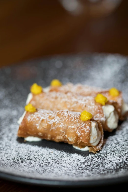 a close up of a plate of food on a table, pastry, 8 1 5, square, long-shot