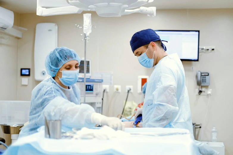 a couple of people that are in a room, surgery theatre, profile image, thumbnail, maintenance