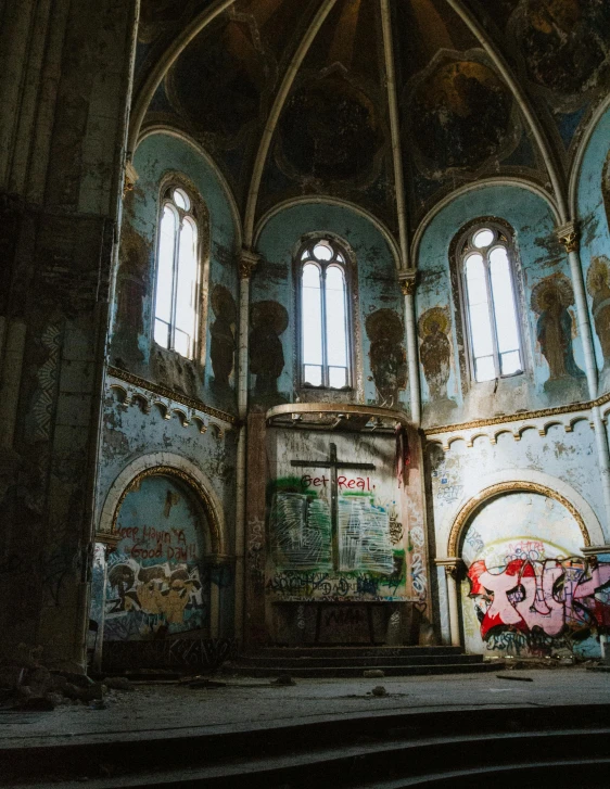 the interior of an abandoned church with graffiti on the walls, an album cover, unsplash contest winner, promo image, tourist photo, rapper, devastated