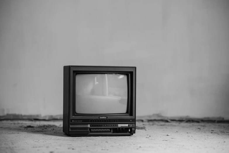 a black and white photo of an old television, by Matija Jama, unsplash, video art, instagram post, 1 9 8 0 s photo, realistic old photo, an abandoned old
