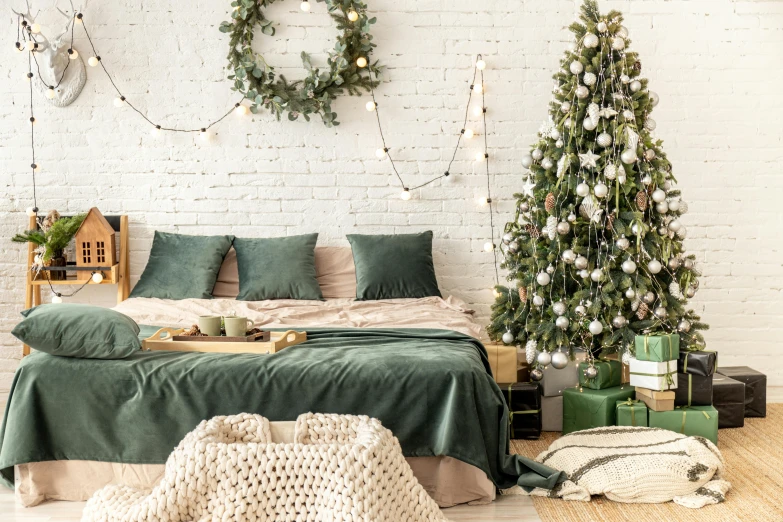 a bed sitting in a bedroom next to a christmas tree, trending on pexels, green and white, rectangle, flat, apartment