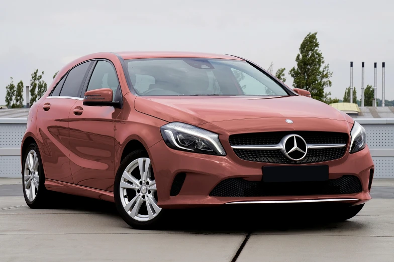 a red mercedes cla parked in a parking lot, pexels contest winner, in shades of peach, square, 2263539546], bronze poli