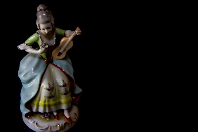 a figurine of a woman playing a guitar, inspired by Jean-Marc Nattier, flickr, 15081959 21121991 01012000 4k, victorian dress, dark vignette, a brightly colored