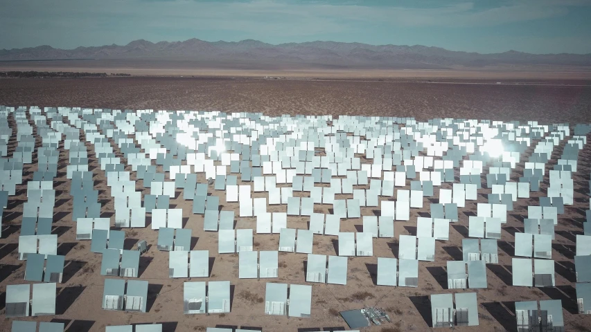 a large array of mirrors in the desert, a colorized photo, fan favorite, colorized photon, digital still, solar