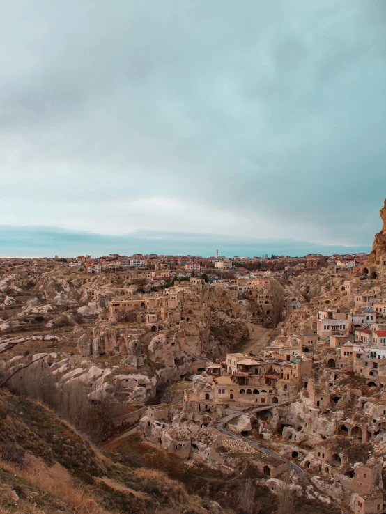 a view of a city from the top of a hill, a detailed matte painting, pexels contest winner, mardin old town castle, mud and brick houses, smol, panoramic