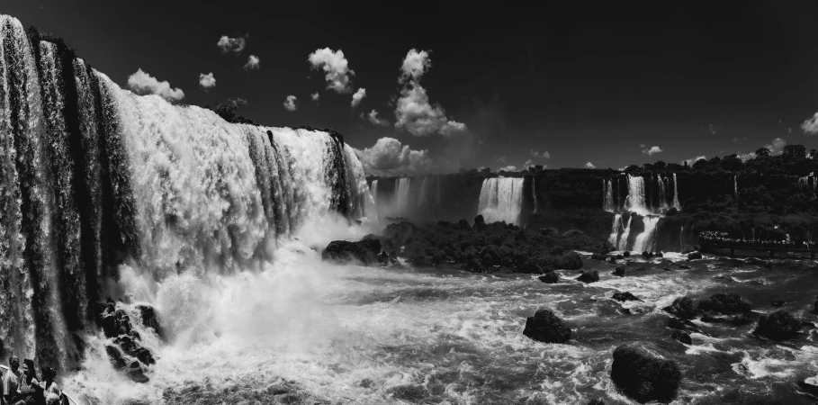 a black and white photo of a waterfall, by Felipe Seade, panoramic shot, skies, photographic print, animation