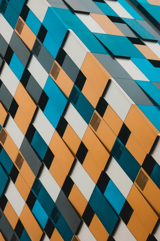 a wall that has many different colored squares on it, by Sarah Morris, trending on unsplash, geometric abstract art, striped orange and teal, angular metal, high angle close up shot, behance lemanoosh