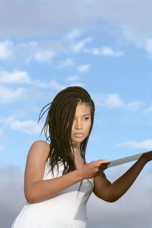a woman in a white dress holding a frisbee, inspired by Scarlett Hooft Graafland, computer art, box braids, holding a clipboard, with clouds in the sky, black teenage girl