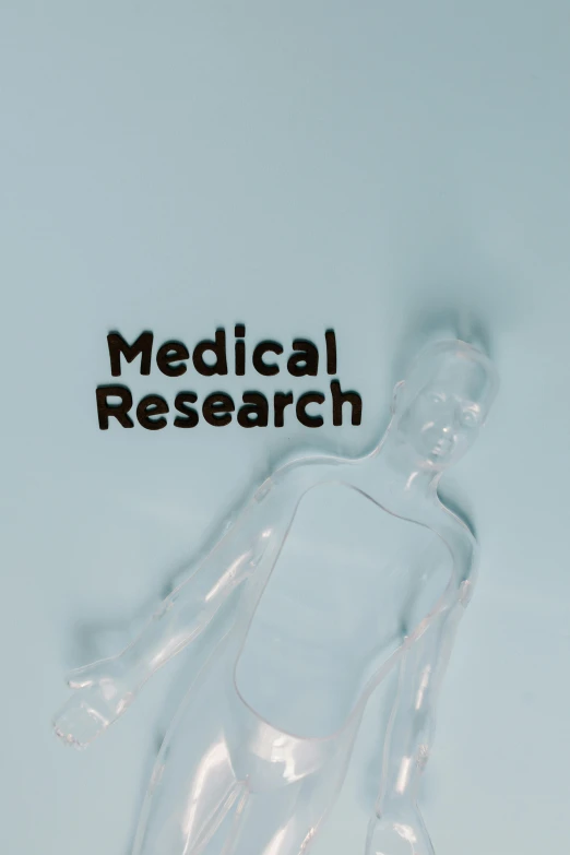 a plastic figure with the words medical research on it, an album cover, translucent material, looking partly to the left, intubation equipment, 【 sciart 💙💜 mson