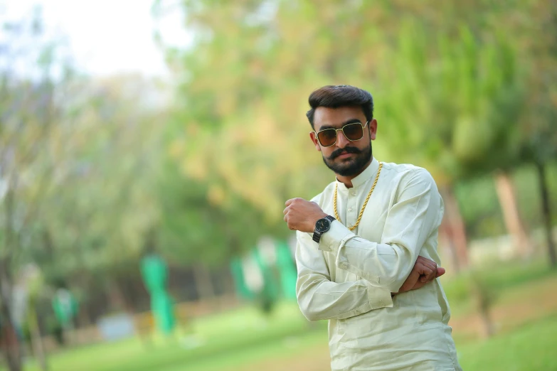 a man in a white shirt posing for a picture, a picture, inspired by Saurabh Jethani, pexels contest winner, hurufiyya, greenish tinge, background, profile image, glam photo