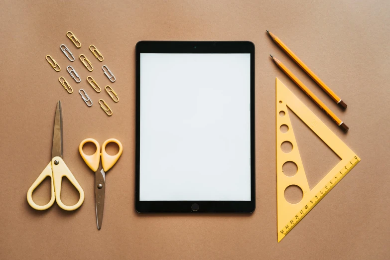 a tablet computer sitting on top of a table, trending on pexels, computer art, knolling, 9 9 designs, teacher, brown and white color scheme