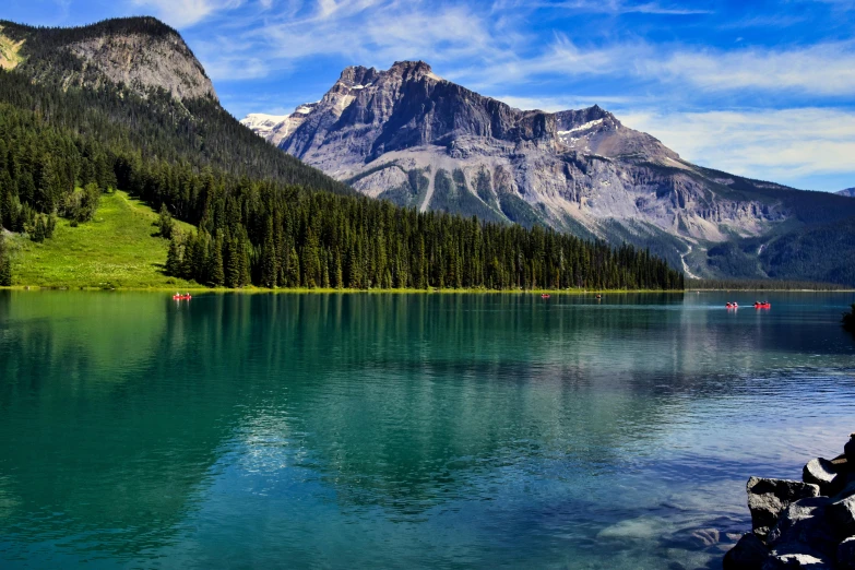 a body of water with mountains in the background, pexels contest winner, banff national park, fan favorite, green water, 2070