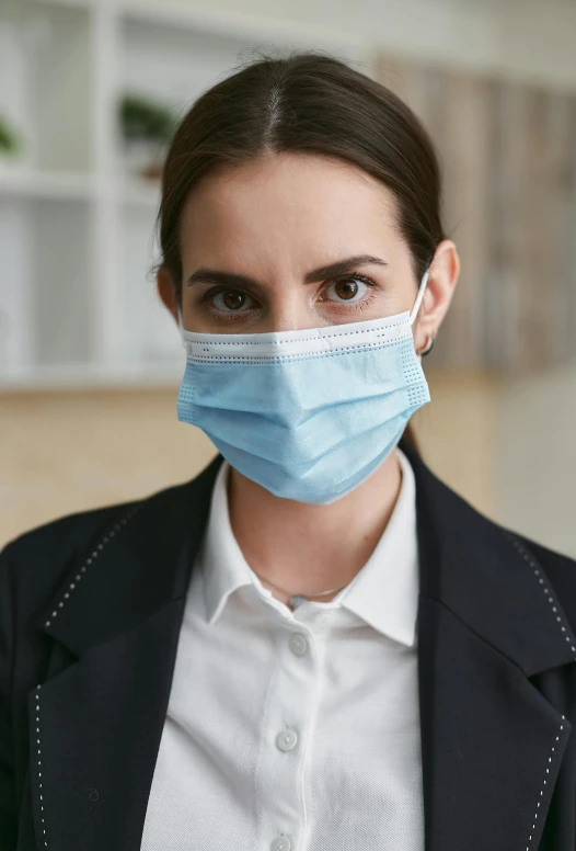 a woman in a business suit wearing a face mask, renaissance, thumbnail, promo image, surgical supplies, innocent look