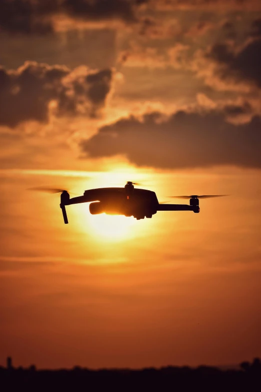 a small airplane flying in the sky at sunset, pexels contest winner, happening, police drones, avatar image, concert, 2 0 2 2 photo