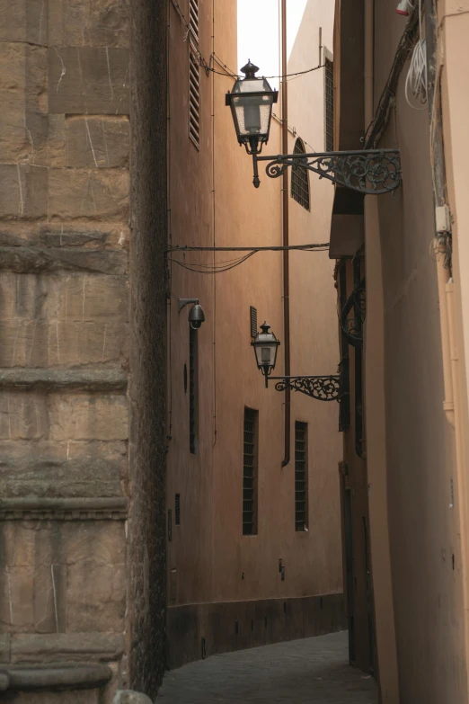 a narrow alley in an old european city, by Carlo Martini, pexels contest winner, renaissance, sconces, florence, fine art print, stacked image