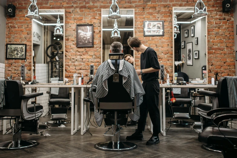 a barber cutting a man's hair in a barber shop, by Adam Marczyński, pexels contest winner, luxurious environment, profile image, thumbnail, sydney hanson