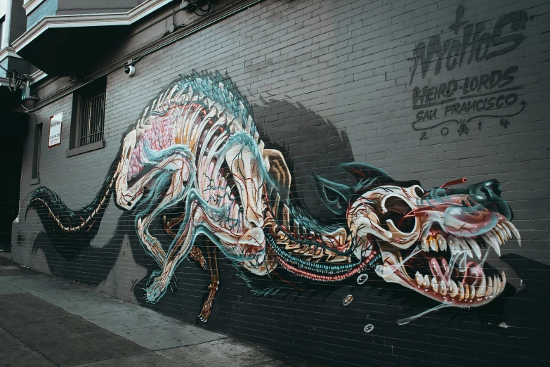 a mural painted on the side of a building, graffiti art, by Meredith Dillman, pexels contest winner, street art, monster anatomy, feral, background image