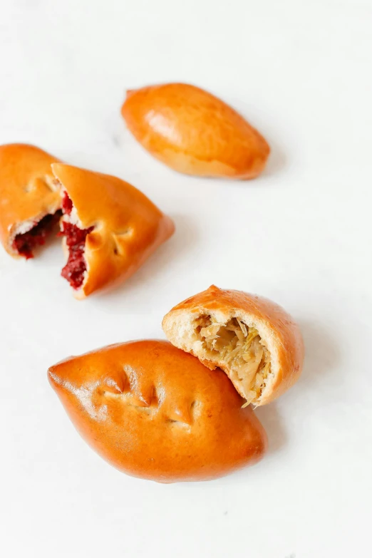 a close up of a doughnut with a bite taken out of it, mingei, bao pnan, 3 - piece, thumbnail, cherry