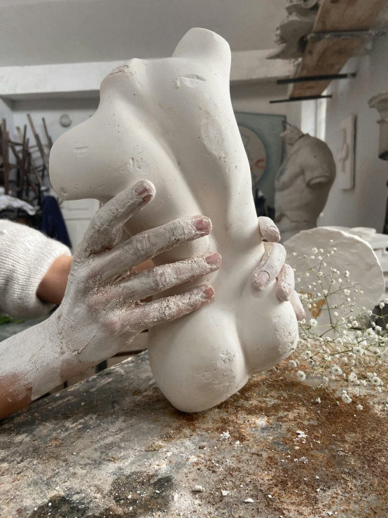 a woman is making a sculpture out of clay, a marble sculpture, inspired by Sarah Lucas, reddit, high heels and gloves. motion, carved in white marble, singularity sculpted �ー etsy, ilustration