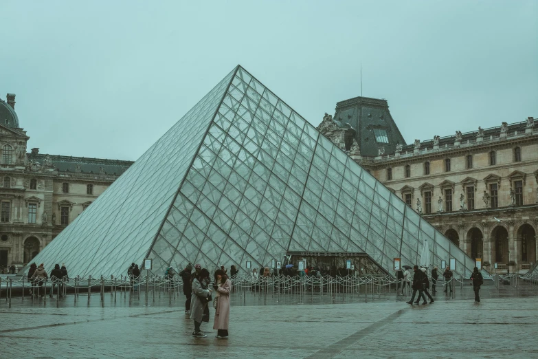 a group of people standing in front of a glass pyramid, a marble sculpture, by Julia Pishtar, pexels contest winner, visual art, french architecture, gif, overcast weather, romantic period