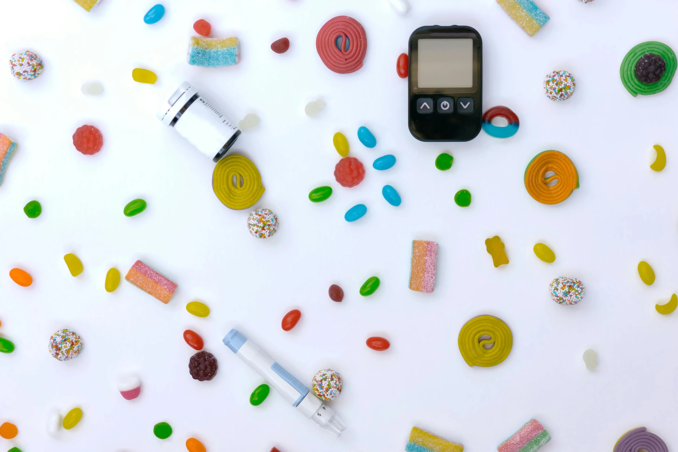 a close up of a cell phone surrounded by confetti sprinkles, inspired by Damien Hirst, pexels, small vials and pouches on belt, made out of sweets, colorful medical equipment, background image