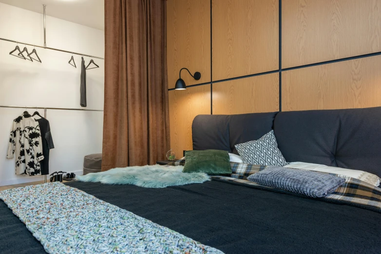 a bed room with a neatly made bed, inspired by Reinier Nooms, unsplash, mixed materials, panels, lots de details, brown